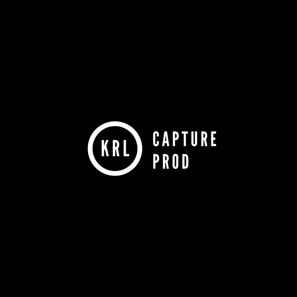 Logo minimaliste en blanc sur fond noir : cercle contenant les lettres 'KRL' à gauche, et le texte 'CAPTURE PROD' aligné verticalement à droite.